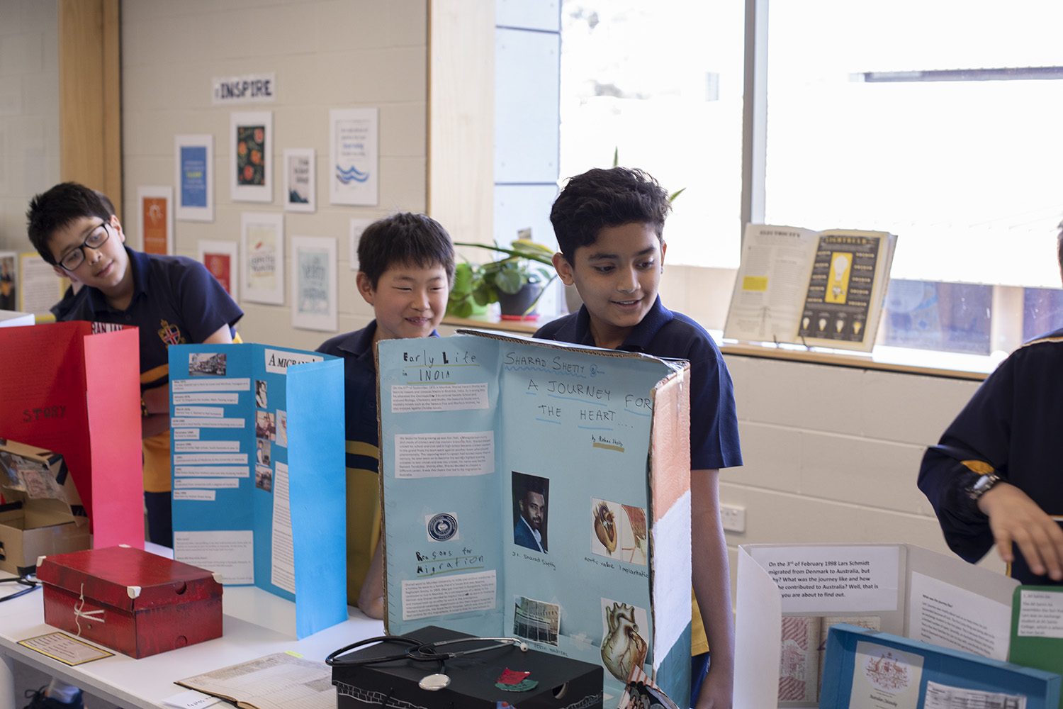 Year 6 boys dig through the archives to create a Migration Museum ...